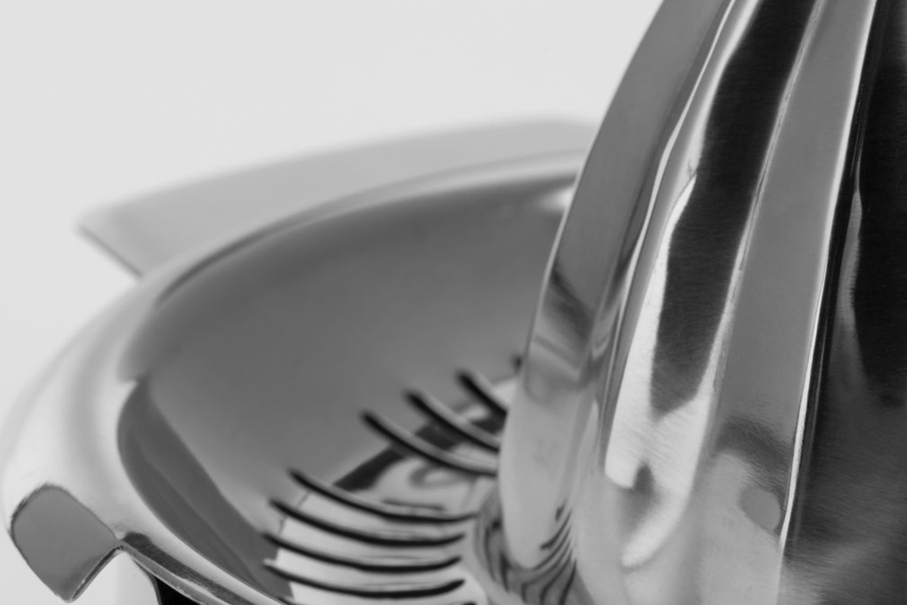 Citruspresse med skål, rustfrit stål