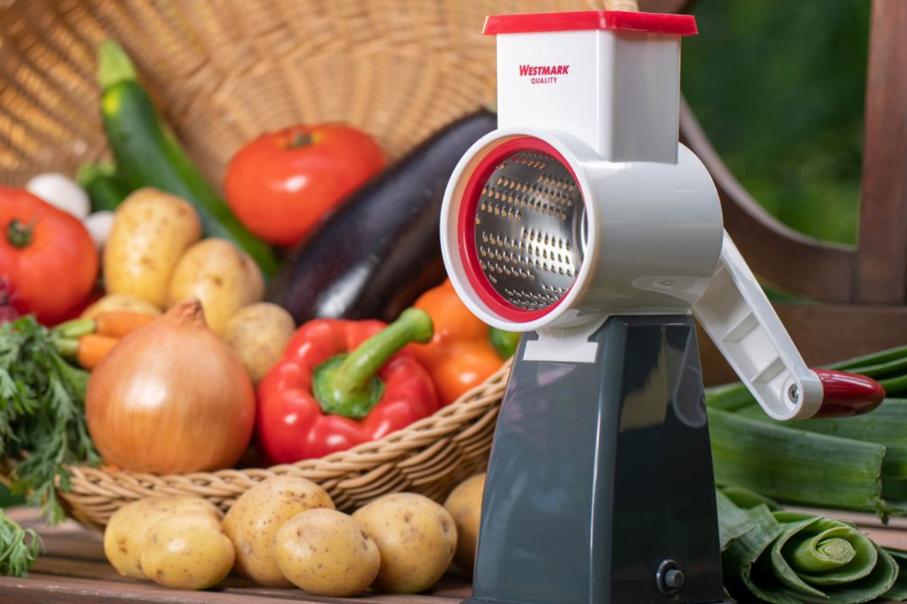 Råkostmaskine med 4 rivejern