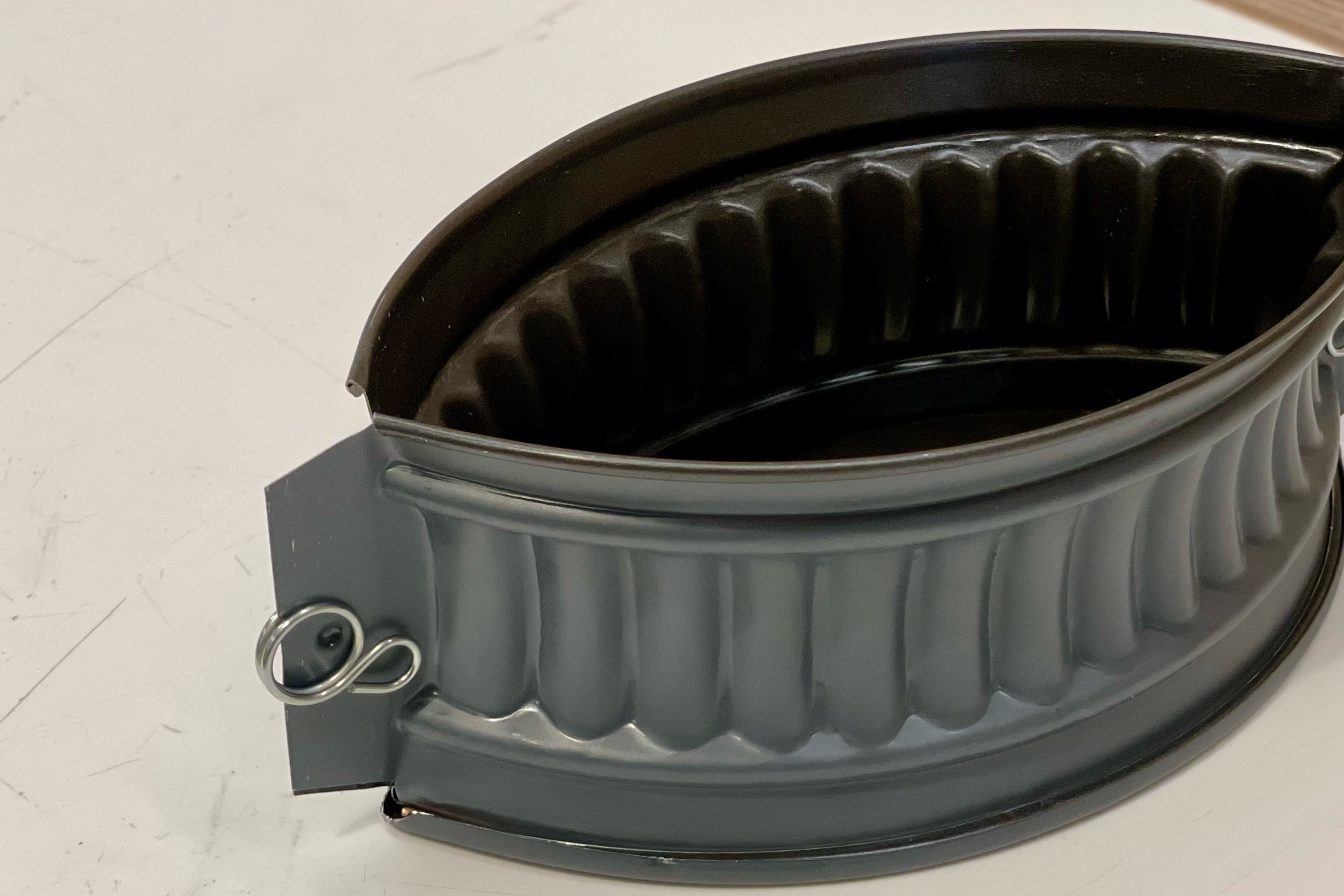 Patéform, oval, blik med belægning